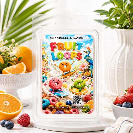 A packaged wax melt or scented melt product labeled 'FRUIT LOOPS' by Chandelle & Savon, shown in a clear plastic clamshell package. The front artwork is highly colorful and playful, featuring cartoon donuts, berries, citrus, and a parrot over a cereal-style background.