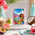 Chandelle & Savon Rio Rush tropical wax melts in a clear clamshell package, styled on a marble coaster with guava, a coconut, pink hibiscus flowers, and a blue glass bottle.